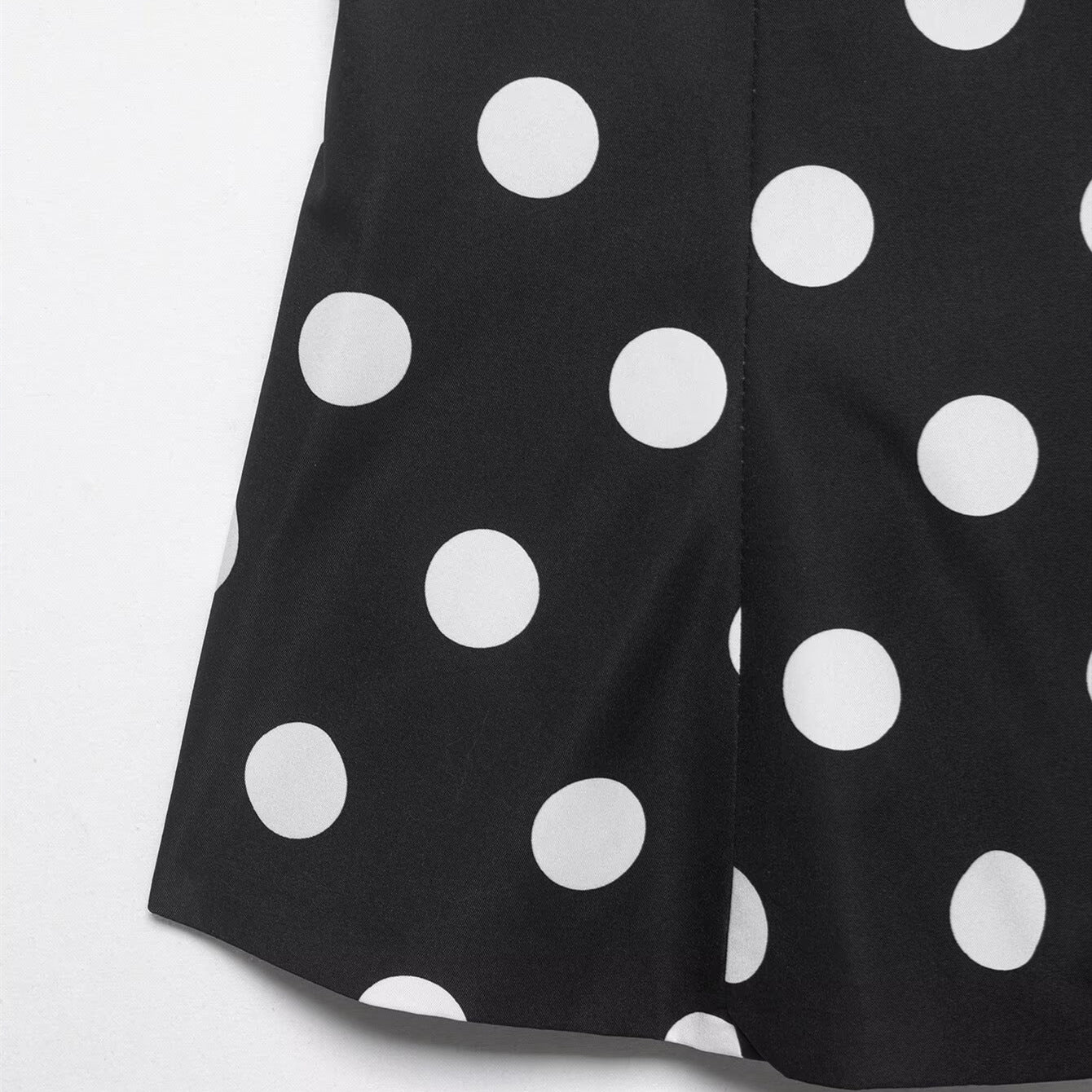 Bow embellished polka dot hanging neck collar sleeveless top